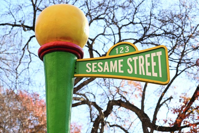 The Sesame Street sign is seen on a float in 2023 in New York City.