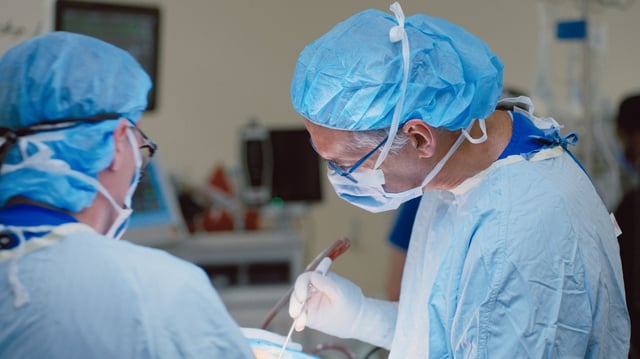 Surgeons performing the first Neuralink device implant surgery in Canada.