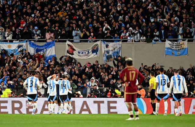 Soccer Football - World Cup - CONMEBOL Qualifiers - Argentina v Venezuela - Estadio Monumental, Buenos Aires, Argentina - September 4, 2025 Argentina's Lionel Messi celebrates scoring their third goal with teammates REUTERS/Rodrigo Valle