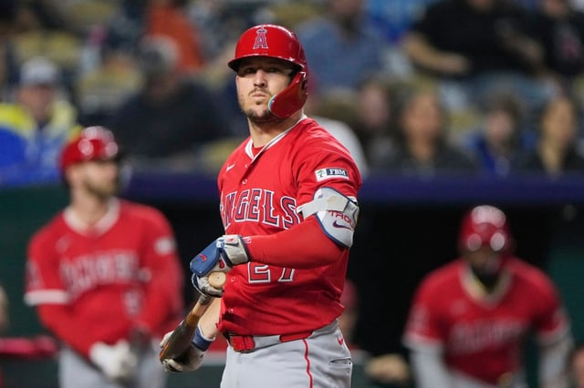 Angels star Mike Trout reacts after striking out during the eighth inning of their game against the Kansas City Royals on Thursday night in Kansas City, Mo. The Angels lost, 4-3. (AP Photo/Charlie Riedel)