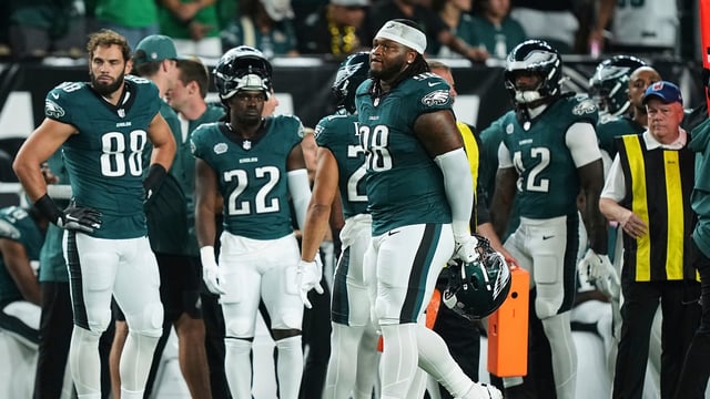 Philadelphia Eagles defensive tackle Jalen Carter (98) walks off the field after being disqualified for unsportsman like conduct before an NFL football game against the Dallas Cowboys Thursday, Sept. 4, 2025, in Philadelphia.