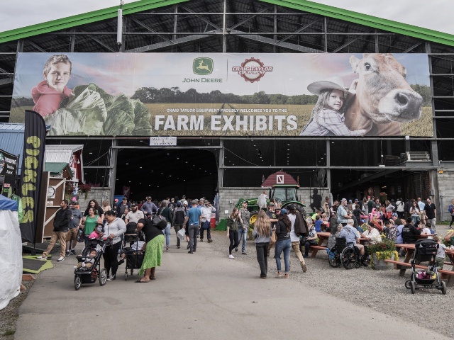 People visit the Alaska State Fair in Palmer, Alaska, United States on August 23, 2025. The Alaska State Fair welcomes thousands of visitors this year. The fair, which was first held in 1936, continues to be one of the most established traditions of Alaska with a history of about 89 years. The event, held every year during the final days of the summer season in Palmer, showcases agriculture, animal husbandry, handicrafts and cultural elements of Alaska. The 2025 Alaska State Fair opened its doors on August 15 and will continue until September 1. The fair includes amusement park entertainments, antique tractor shows, horse riding competitions, pet and livestock exhibitions raised by young people within the scope of the 4-H program, and dog shows. This year features events such as the 'Berry Good Pie' competition, the big pumpkin weighing, seafood competitions, and similarity contests for families. The Alaska State Fair provides opportunities for local producers, farmers and artists to introduce their products, and also contributes to the region economically. The fair, which has an important place in the cultural life of Alaska with its 89-year-old tradition, has become an unforgettable meeting point for both locals and guests from out-of-state this year, as it does every year. (Hasan Akbas/Anadolu via Getty)
