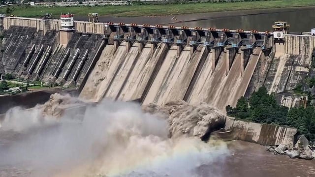 Gates of Salal Dam have been opened as water levels in the Chenab river rise following heavy rainfall in the region, in Reasi on Friday. (ANI Video Grab)
