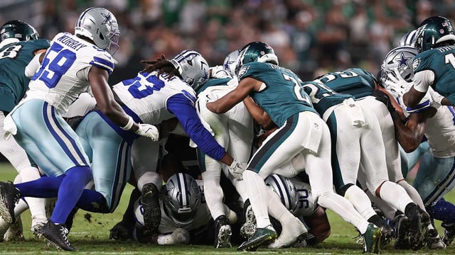 Sep 4, 2025; Philadelphia, Pennsylvania, USA; The Philadelphia Eagles execute a tush push for a first down against the Dallas Cowboys during the fourth quarter of the game at Lincoln Financial Field. Mandatory Credit: Bill Streicher-Imagn Images.