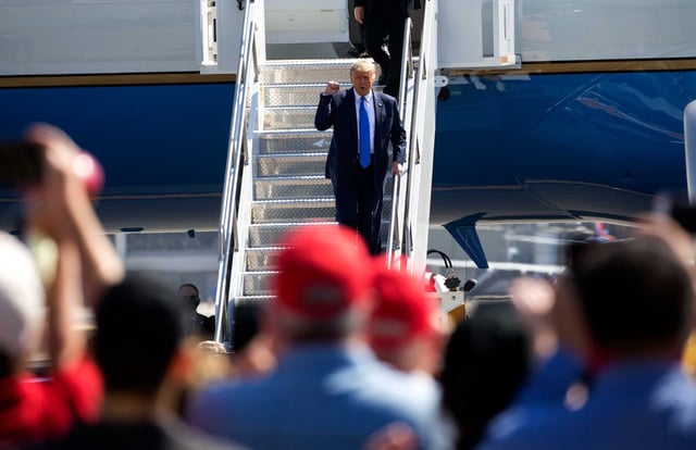 President Donald Trump gets off an aircraft. (Photo: Shutterstock | 
Ringo Chiu)
