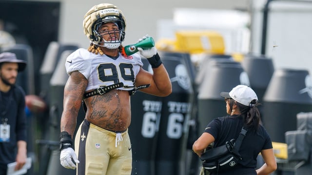 Jul 30, 2025; New Orleans, LA, USA; New Orleans Saints defensive end Chase Young (99) cools down on a break during training camp at Ochsner Sports Performance Center. Mandatory Credit: Stephen Lew-Imagn Images
