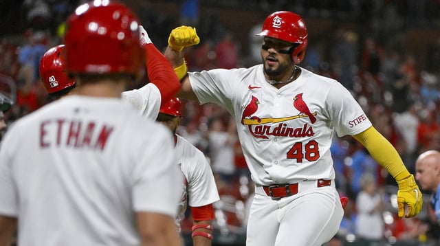 Sep 2, 2025; St. Louis, Missouri, USA; St. Louis Cardinals designated hitter Ivan Herrera (48) celebrates with center fielder Victor Scott II (11) and first baseman Willson Contreras (40) after hitting a two run home run against the Athletics during the sixth inning at Busch Stadium. Mandatory Credit: Jeff Curry-Imagn Images