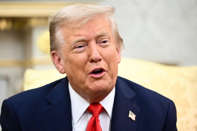 Las fiestas tradicionales mexicanas de Chicago en riesgo por las amenazas de Donald Trump de desplegar la Guardia Nacional en la ciudad (Photo by Mandel NGAN / AFP)
