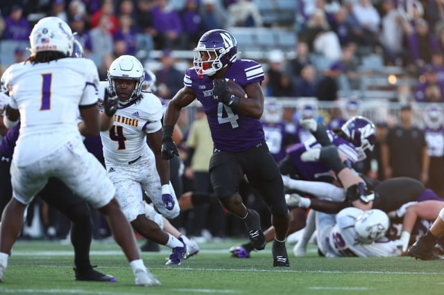 Northwestern running back Cam Porter looks for yardage against Western Illinois during the first half on Sept. 5, 2025, at Martin Stadium in Evanston. (Michael Hirschuber/Getty Images)