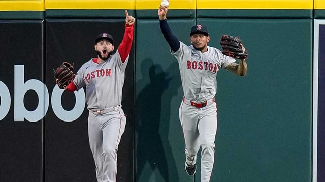Boston Red Sox center fielder Ceddanne Rafaela (3), right, celebrates catching a fly out against Detroit Tigers designated hitter Kerry Carpenter (30) next to right fielder Rob Refsnyder (30), left, during the seventh inning at Comerica Park in Detroit on Wednesday, May 14, 2025. Junfu Han / USA TODAY NETWORK via Imagn Images