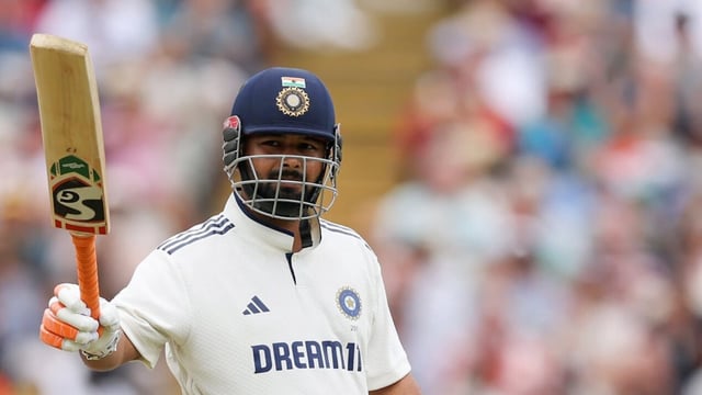 India's Rishabh Pant celebrates a half century.