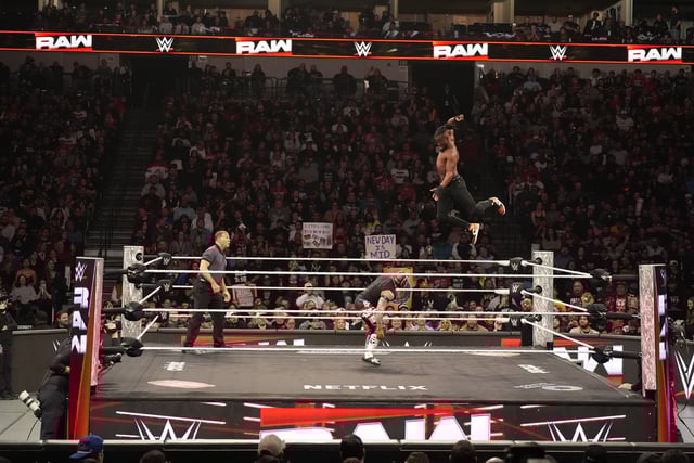 DALLAS, TEXAS - JANUARY 20: Kofi Kingston and Rey Mysterio in action during WWE RAW at American Airlines Center on January 20, 2025 in Dallas, Texas.