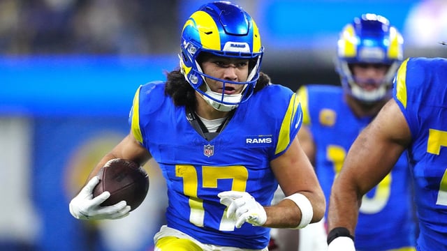 Dec 28, 2024; Inglewood, California, USA; Los Angeles Rams wide receiver Puka Nacua (17) carries the ball against the Arizona Cardinals in the second half at SoFi Stadium. Mandatory Credit: Kirby Lee-Imagn Images
