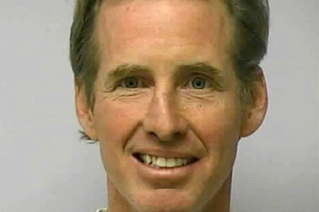 Ryan W. Routh poses in a jail booking photograph in Greensboro, North Carolina, U.S. February 10, 2010.  Guilford County Sheriff's Office/Handout via REUTERS/File Photo