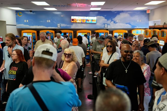 People wait in line to buy lottery tickets at the Lotto Store just inside the California border, near Primm, Nevada, on Sept. 3, 2025. (John Locher/AP)