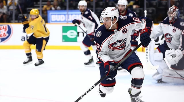 Oct 26, 2024; Nashville, Tennessee, USA; Columbus Blue Jackets right wing Kevin Labanc (62) takes the puck down ice in the first period against the Nashville Predators at Bridgestone Arena. Mandatory Credit: Casey Gower-USA TODAY Sports