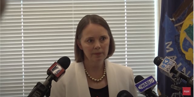 Maine Secretary of State Shenna Bellows speaks at a press conference.