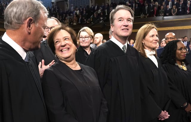 US Chief Justice John Roberts with (left to right) Justices Elena Kagan, Brett Kavanaugh, Amy Coney Barrett, and Ketanji Brown Jackson at the 2023 State of the Union address.
