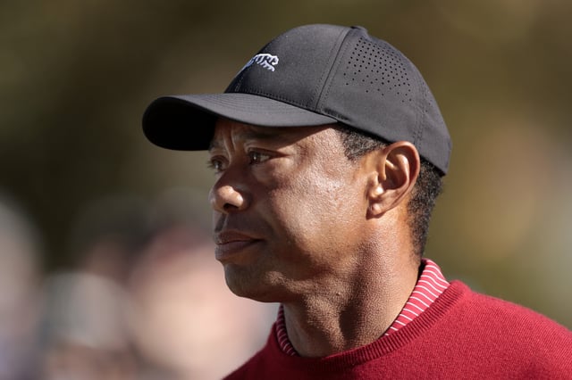 ORLANDO, FLORIDA - DECEMBER 22: Tiger Woods of the United States walks from the first tee during the second round of the PNC Championship at Ritz-Carlton Golf Club on December 22, 2024 in Orlando, Florida. (Photo by Douglas P. DeFelice/Getty Images)