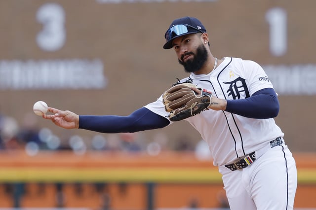 DETROIT, MI - SEPTEMBER 7: Second baseman Gleyber Torres #25 of the Detroit Tigers throws out Curtis Mead of the Chicago White Sox at first base during the eighth inning at Comerica Park on September 7, 2025 in Detroit, Michigan.