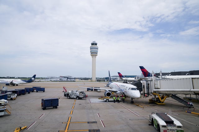 The air traffic control tower is seen from the Hartsfield-Jackson Atlanta International Airport terminal, in Atlanta, Georgia, U.S. May 15, 2025.  REUTERS/Megan Varner/File Photo