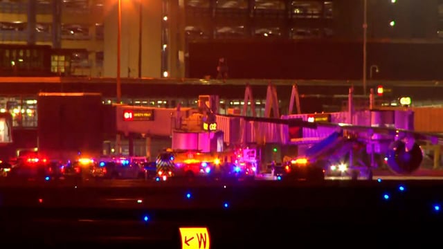 Emergency crews at Minneapolis-Saint Paul International Airport after Delta Air Lines Flight 56 made an emergency landing.