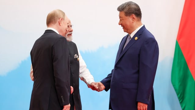 Vladimir Putin, Xi Jinping, and Narendra Modi. (Alexander Kazakov/Russian Presidential Press and Information Office)