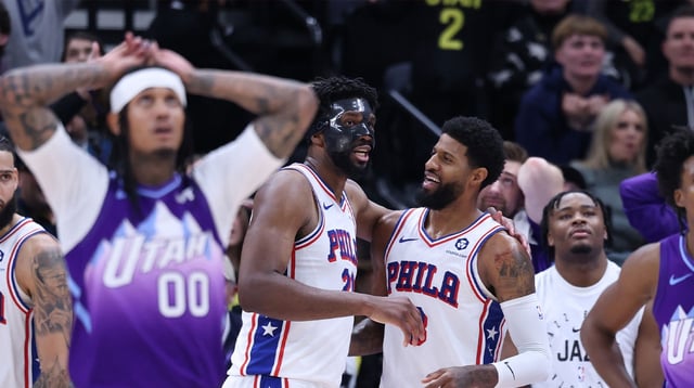 Dec 28, 2024; Salt Lake City, Utah, USA; Philadelphia 76ers center Joel Embiid (21) and forward Paul George (8) react to a play against the Utah Jazz during the fourth quarter at Delta Center. Mandatory Credit: Rob Gray-Imagn Images
