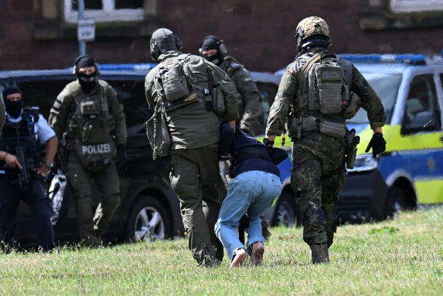 Officials said after the attack that two men and a woman were killed by being stabbed in the neck