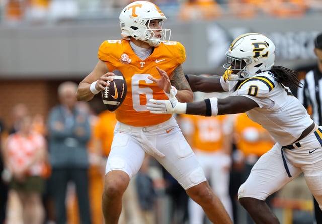 Tennessee quarterback Joey Aguilar (6) is pressured by an East Tennessee State defender during their game at Neyland Stadium.