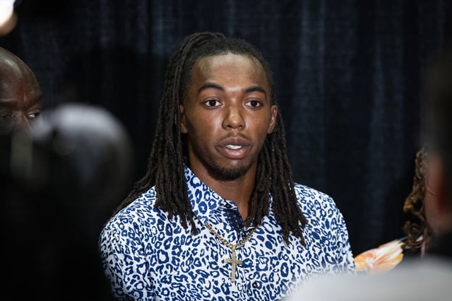 William McNeil Jr. speaks alongside members of his legal team during a press conference at the National Bar Association's annual convention on July 29, 2025 in Chicago, Illinois.