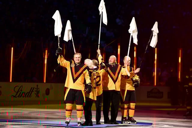Vancouver Canucks Alumni raise the white towel in a celebration (Anne-Marie Sorvin-USA TODAY Sports)