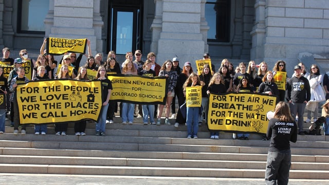Emma Weber leads a chant at a Colorado state capitol rally in support of “The Green New Deal for Colorado Schools.”