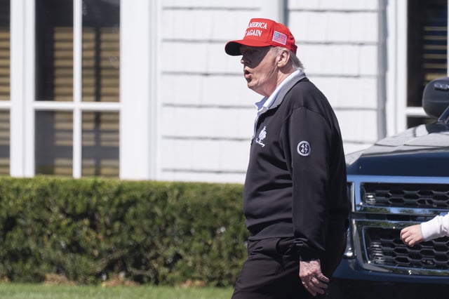 President Donald Trump walks at the Trump National Golf Club in Sterling, Va., Saturday, Aug. 30, 2025 - the day before the alleged security breach. (AP Photo/Manuel Balce Ceneta)
