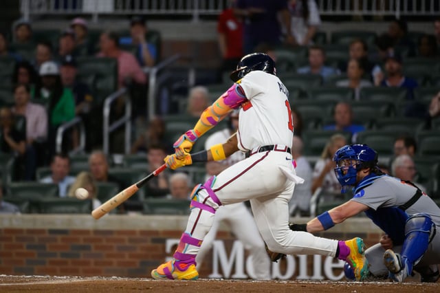 ATLANTA, GEORGIA - SEPTEMBER 9: Ronald Acuña Jr. #13 of the Atlanta Braves hits a double in the third inning of a game against the Chicago Cubs at Truist Park on September 9, 2025 in Atlanta, Georgia.