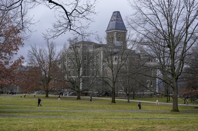 People walk on the campus of Cornell University in Ithaca, N.Y., on Feb. 2, 2024.