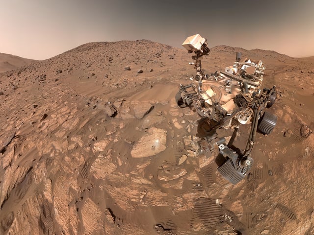 A "selfie" taken by NASA's Perseverance Mars rover, made up of 62 individual images, on July 23, in this image released on September 10, 2025. A rock nicknamed "Cheyava Falls," which has features that may bear on the question of whether the Red Planet was long ago home to microscopic life, is seen to the left of the rover near the center of the image. NASA/JPL-Caltech/MSSS/Handout via REUTERS    THIS IMAGE HAS BEEN SUPPLIED BY A THIRD PARTY