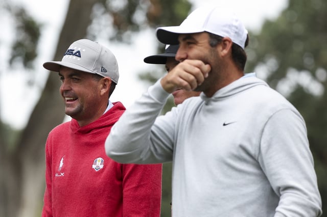 Keegan Bradley talks with Scottie Scheffler and his caddie Ted Scott on the 17th hole prior to the Procore Championship 2025 at Silverado Resort and Spa on September 10, 2025 in Napa, California.