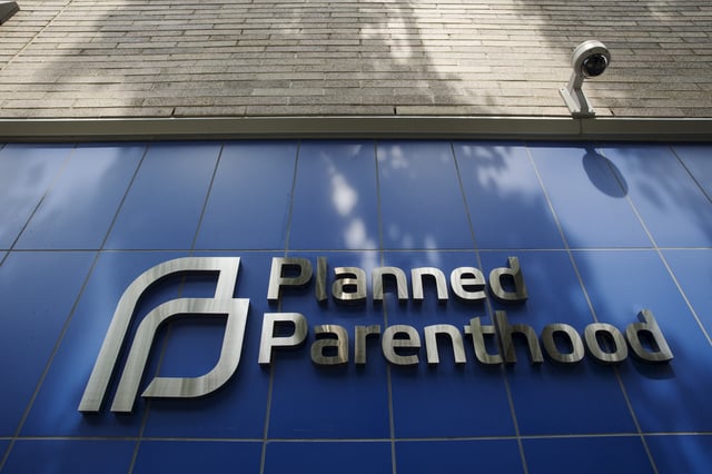 A sign is pictured at the entrance to a Planned Parenthood building in New York August 31, 2015. REUTERS/Lucas Jackson/ File Photo