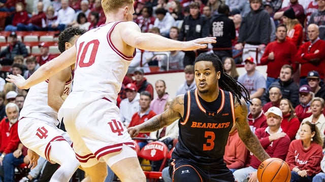 Dec 3, 2024; Bloomington, Indiana, USA; Sam Houston State Bearkats guard Lamar Wilkerson (3) dribbles the ball while Indiana Hoosiers forward Luke Goode (10) defends in the second half at Simon Skjodt Assembly Hall. Mandatory Credit: Trevor Ruszkowski-Imagn Images