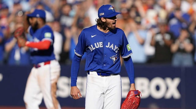 Sep 11, 2025; Toronto, Ontario, CAN; Toronto Blue Jays starting pitcher Kevin Gausman (34) reacts after a complete game win over the Houston Astros at Rogers Centre. Mandatory Credit: John E. Sokolowski-Imagn Images