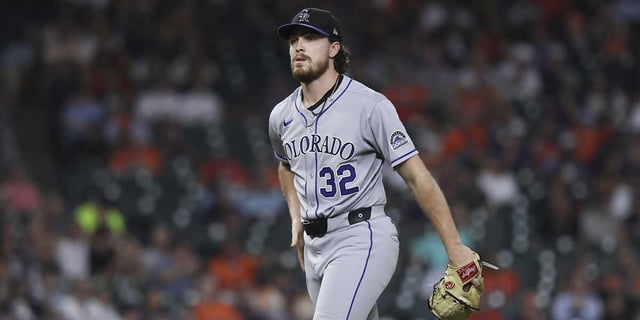 Aug 27, 2025; Houston, Texas, USA; Colorado Rockies starting pitcher Chase Dollander (32) reacts after issuing a walk during the fifth inning against the Houston Astros at Daikin Park. Mandatory Credit: Troy Taormina-Imagn Images