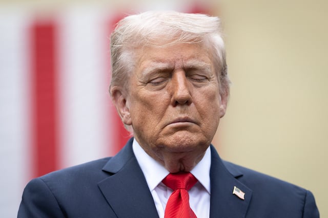 ARLINGTON, VIRGINIA - SEPTEMBER 11: U.S. President Donald Trump observes a moment of silence during a September 11th observance event in the courtyard of the Pentagon September 11, 2025 in Arlington, Virginia. Today marks the 24th anniversary of the 9/11 terror attacks that claimed the lives of nearly 3,000 people. (Photo by Win McNamee/Getty Images)