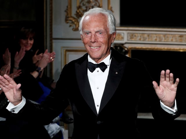 FILE PHOTO: Italian designer Giorgio Armani appears at the end of his Haute Couture Spring-Summer 2019 collection show for fashion house Giorgio Armani Prive in Paris, France, January 22, 2019. REUTERS/Benoit Tessier/File Photo
