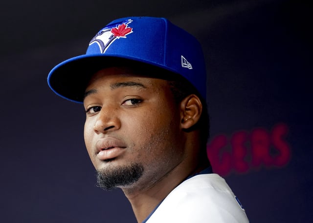 TORONTO, ON - JUNE 18: Orelvis Martinez #13 of Toronto Blue Jays looks on before play starts against the Boston Red Sox in their MLB game at the Rogers Centre on June 18, 2024 in Toronto, Ontario, Canada. (Photo by Mark Blinch/Getty Images)