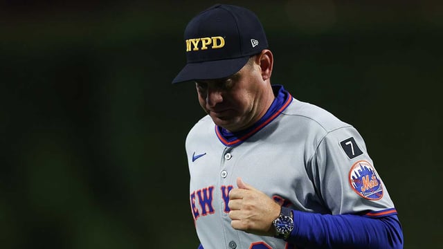 Sep 11, 2025; Philadelphia, Pennsylvania, USA; New York Mets manager Carlos Mendoza (64) jogs back to the dugout after a pitching change during the sixth inning against the Philadelphia Phillies at Citizens Bank Park. Mandatory Credit: Bill Streicher-Imagn Images
