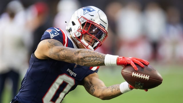 Dec 15, 2024; Glendale, Arizona, USA; New England Patriots cornerback Christian Gonzalez (0) against the Arizona Cardinals at State Farm Stadium. Mandatory Credit: Mark J. Rebilas-Imagn Images