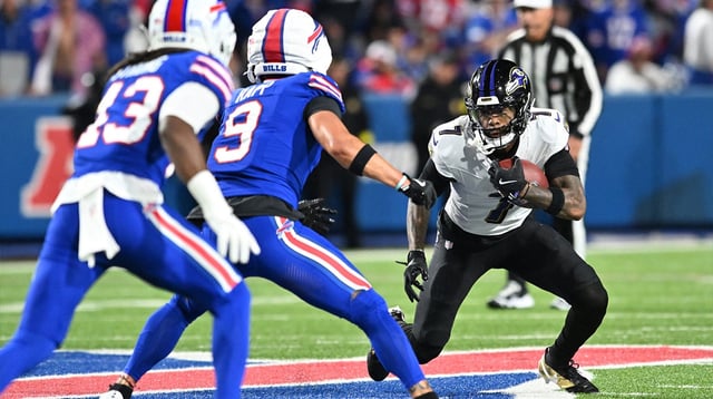 Sep 7, 2025; Orchard Park, New York, USA; Baltimore Ravens wide receiver Rashod Bateman (7) runs with the ball against the Buffalo Bills during the second quarter at Highmark Stadium. Mandatory Credit: Mark Konezny-Imagn Images