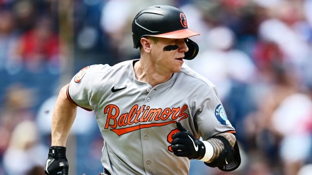 Jul 24, 2025; Cleveland, Ohio, USA; Baltimore Orioles right fielder Tyler O'Neill (9) hits a single during the first inning against the Cleveland Guardians at Progressive Field. Mandatory Credit: Ken Blaze-Imagn Images