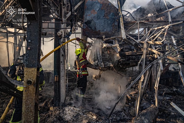 Firefighters work at the site of a Russian drone strike, amid Russia's attack on Ukraine, in Sumy, Ukraine, in this handout picture released September 12, 2025. Press service of the State Emergency Service of Ukraine in Sumy region/Handout via REUTERS